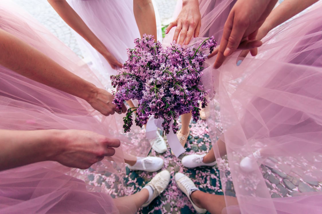 Bridesmaids Having Fun with a Bouquet